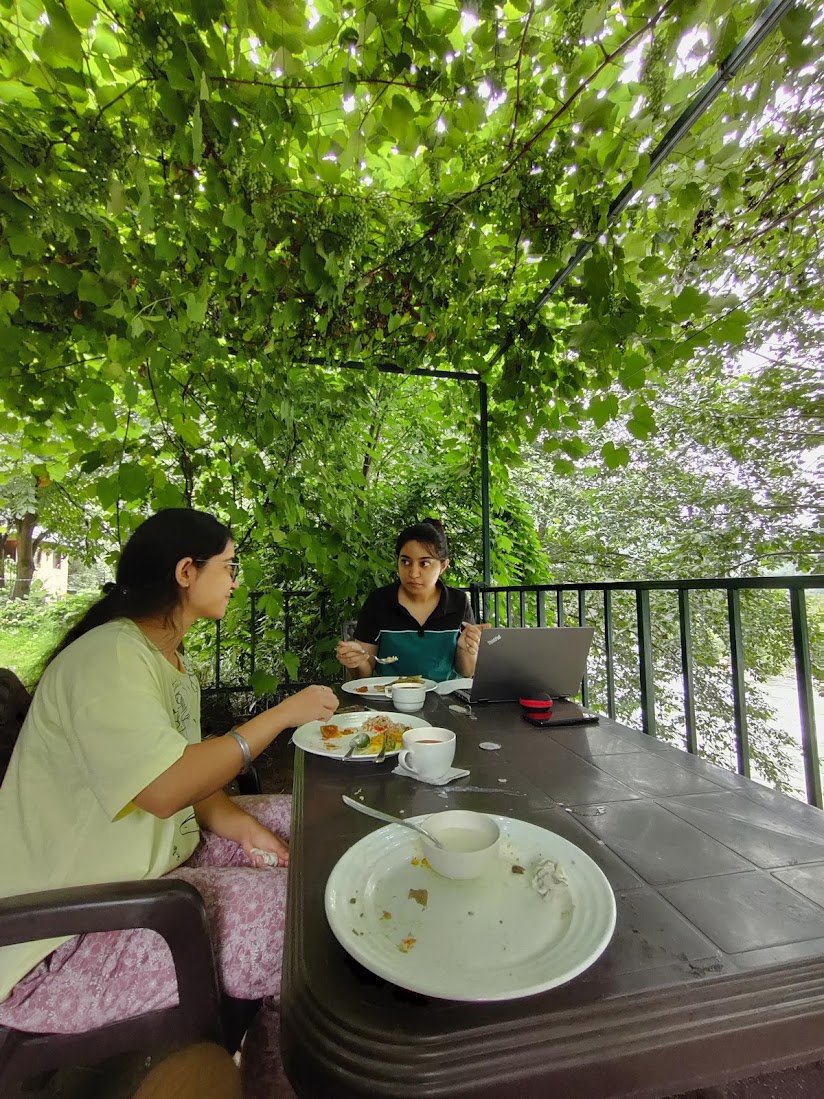 Riverside seating at Thehraav Cafe